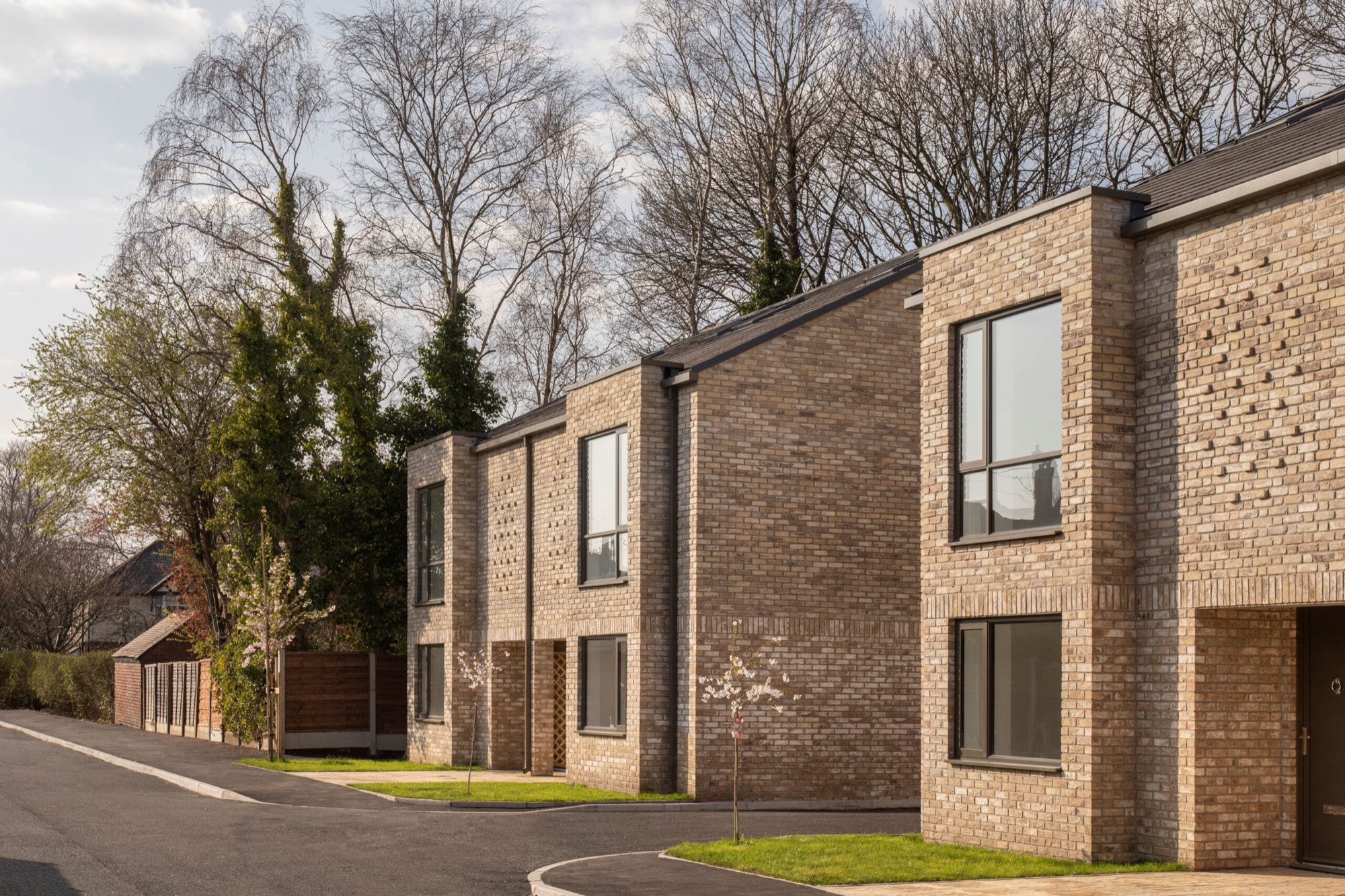 Lawn Drive, a terrace of new brick homes on a private road in Whalley Range